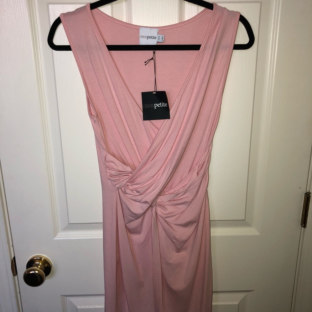 Pink sleeveless dress.